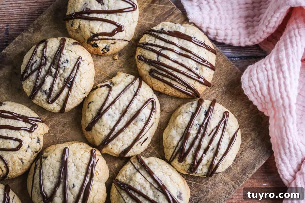 Gluten-Free Easter Cookie Recipes for Spring Baking 12 Easter Cookies packed with marzipan, currants, spice and chocolate resting on a wooden board.
