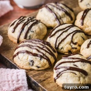 Gluten-Free Easter Cookie Recipes for Spring Baking 13 Easter Cookies packed with marzipan, currants, spice and chocolate resting on a wooden board.