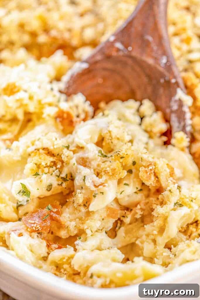 Creamy Baked Mac and Cheese Recipe 3 Creamy baked macaroni and cheese served from a casserole dish