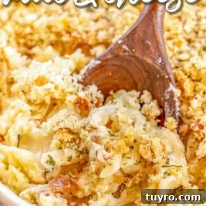 Creamy Baked Mac and Cheese Recipe 8 Scooping mac and cheese from baking dish