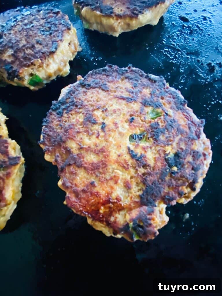 salmon burgers on the Griddle after cooking