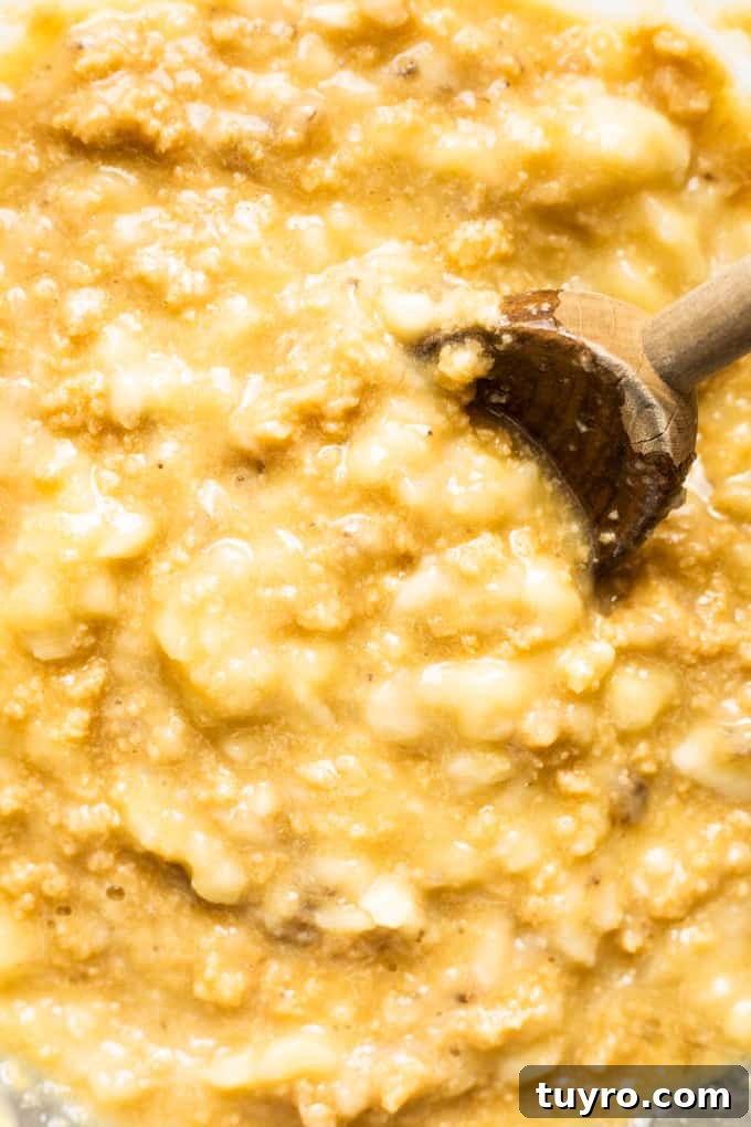 Close up view of mixed banana bread batter.