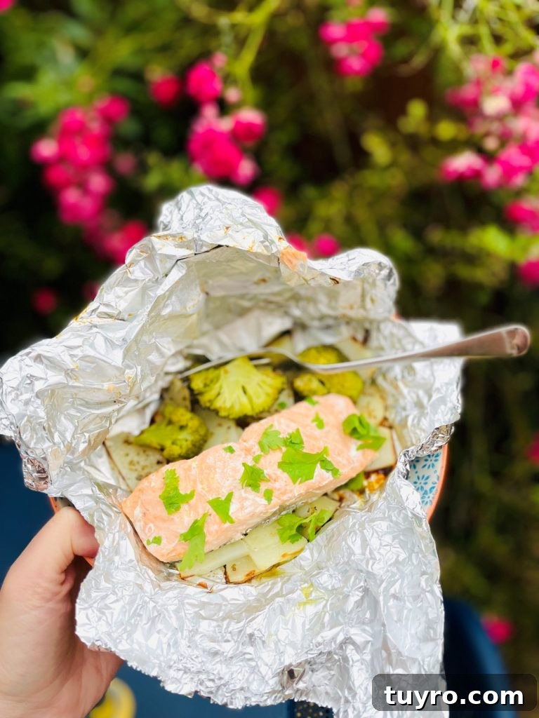 4-Week Weekly Meal Plan: Simple Dinners and Grocery List 7 salmon and potatoes foil pack dinners opened up in the garden.