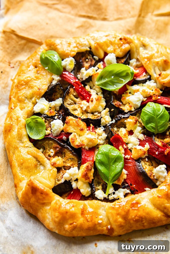 Grilled Eggplant and Roasted Red Pepper Galette 3 Side shot of galette on baking sheet