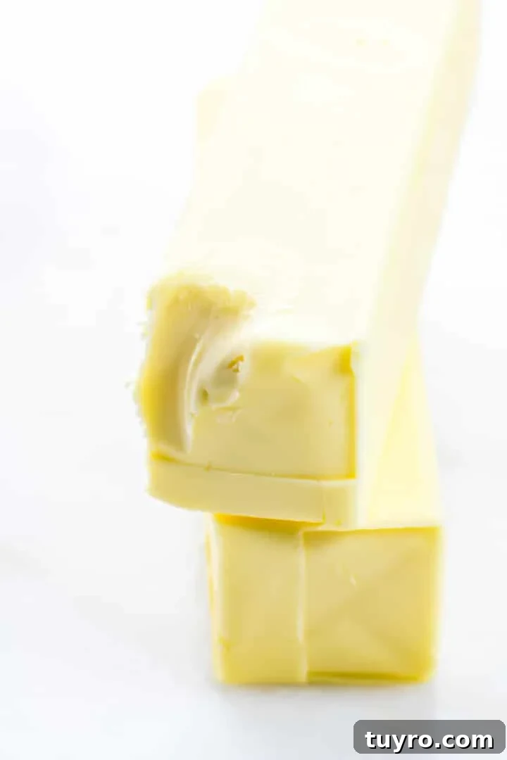 Quick Ways to Soften Butter Fast for Baking and Spreading 2 Learn How to Soften Butter in a pinch for use in cookies, cakes, or other recipes that call for softened butter when you are short on time! // addapinch.com