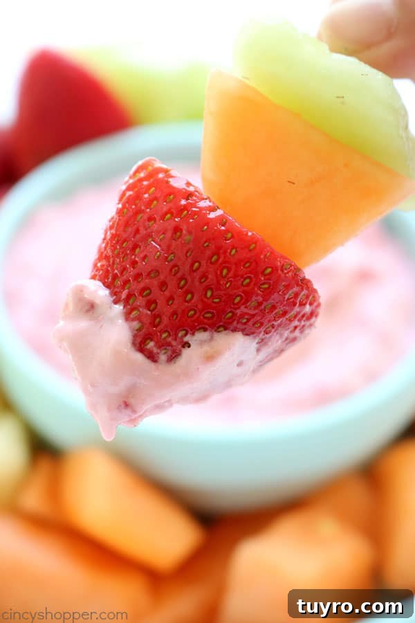 Creamy Raspberry Fruit Dip Recipe for Parties and Snacks 5 Raspberry Fruit Dip - Just 4 ingredients are needed and it is so super simple to make. Great for a summer potluck addition. #FruitDip