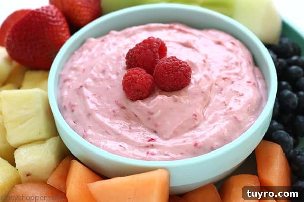 Creamy Raspberry Fruit Dip Recipe for Parties and Snacks 10 Raspberry Fruit Dip - Just 4 ingredients are needed and it is so super simple to make. Great for a summer potluck addition. #FruitDip