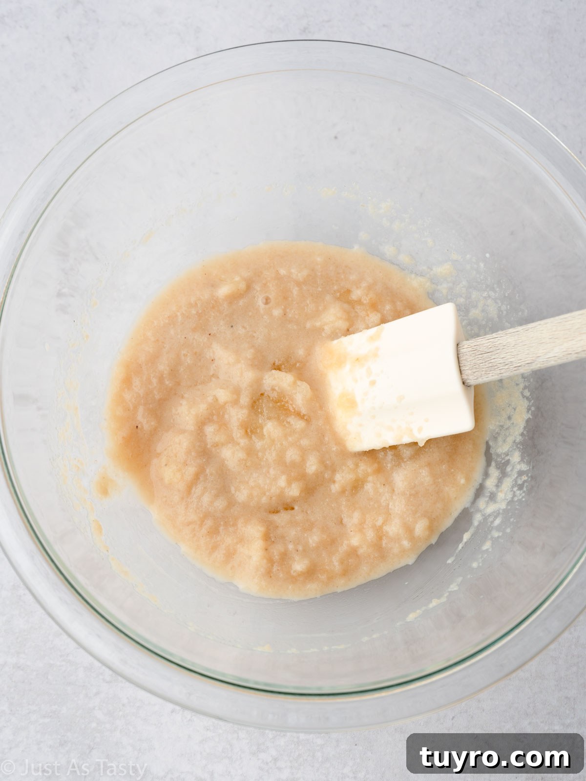 Crispy Air Fryer Apple Fritters Recipe 6 Wet ingredients in a bowl.
