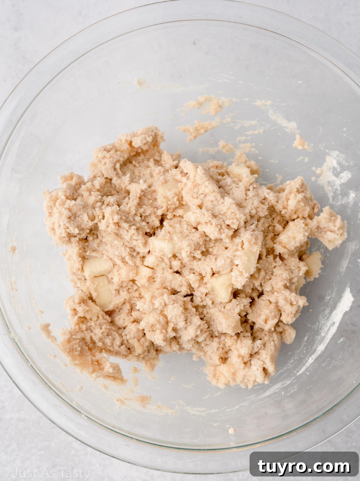 Crispy Air Fryer Apple Fritters Recipe 8 Apple fritter batter in a bowl.