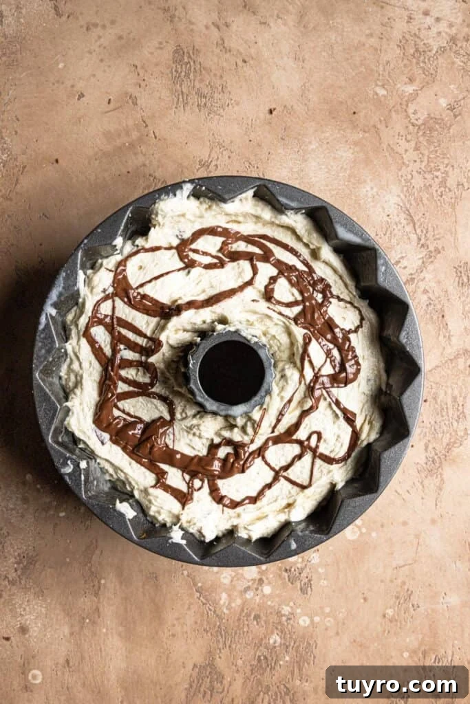 Decadent Snickers Bundt Cake Recipe with Salted Caramel Glaze 11 img 7889 10