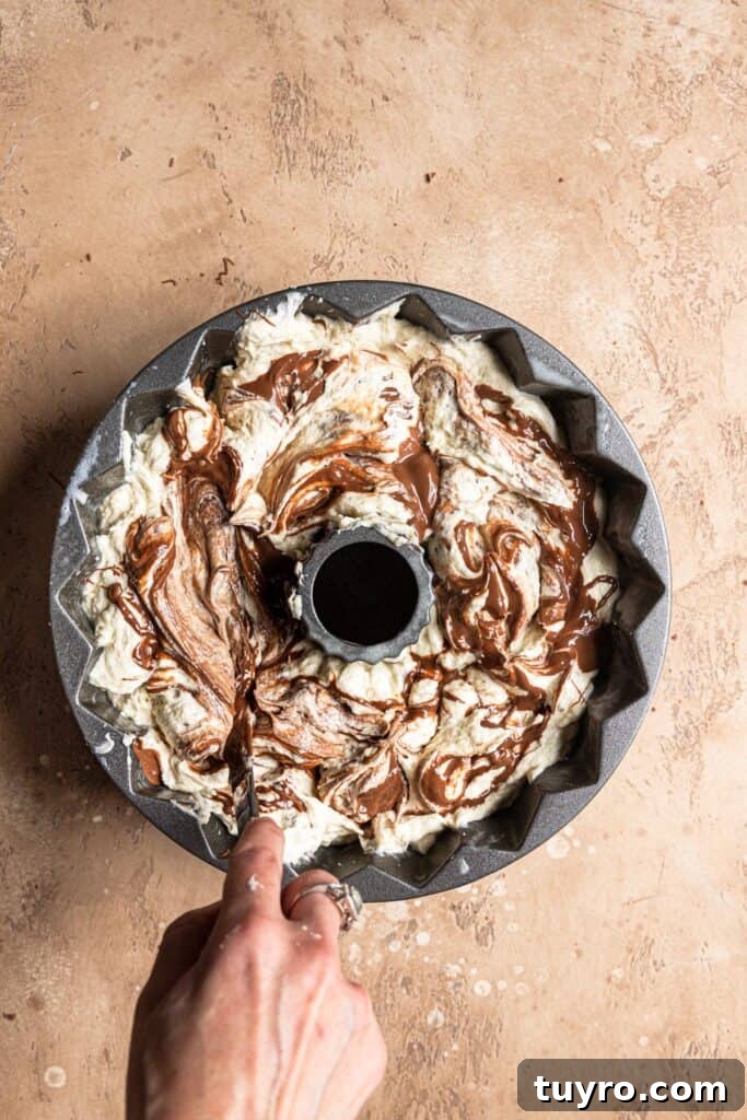 Decadent Snickers Bundt Cake Recipe with Salted Caramel Glaze 12 img 7889 11