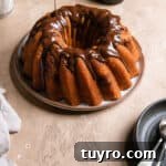 Decadent Snickers Bundt Cake Recipe with Salted Caramel Glaze 17 img 7889 16