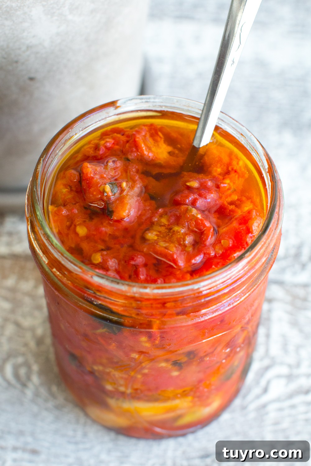 Tomato Confit and Burrata Crostini with Basil and Olive Oil 6 Tomato Confit in a jar