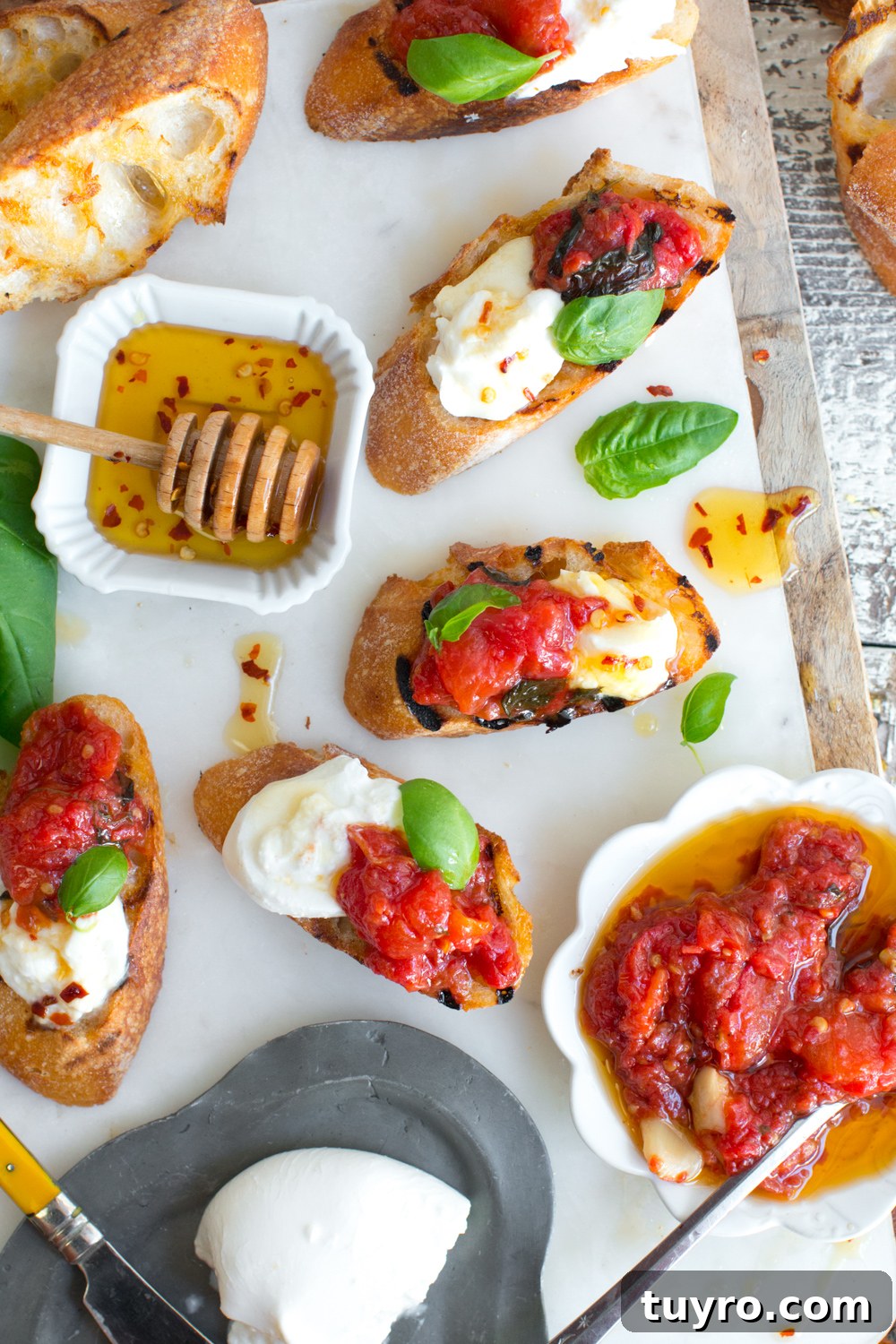 Tomato Confit and Burrata Crostini with Basil and Olive Oil 9 Tomato Confit & Burrata Crostini assembly