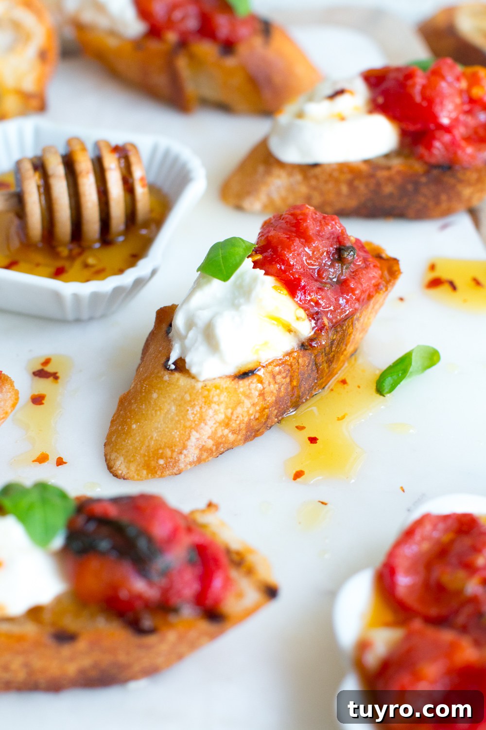Tomato Confit and Burrata Crostini with Basil and Olive Oil 10 Tomato Confit & Burrata Crostini is the ultimate way to preserve those bright and sunny summer tomatoes