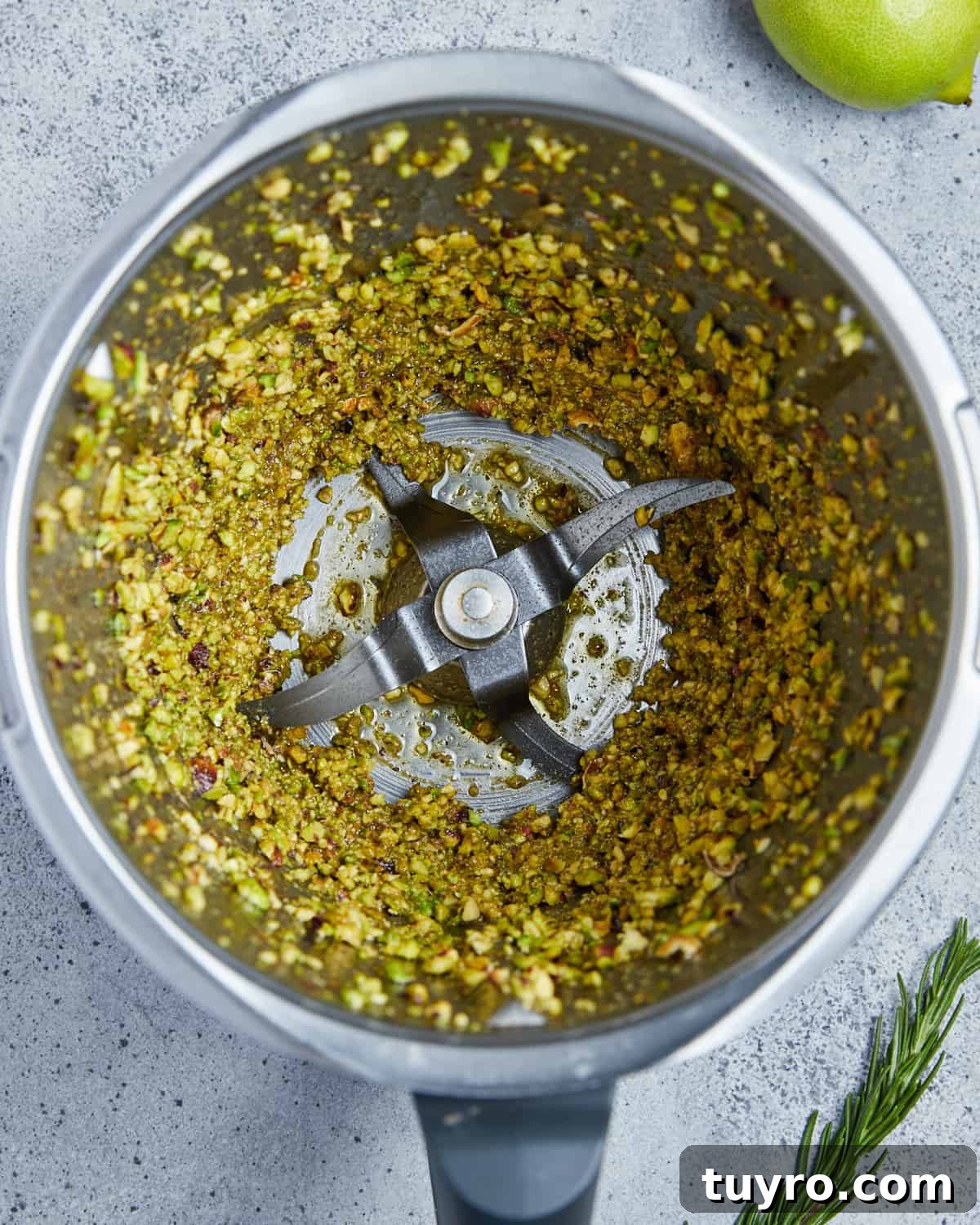 Vegan Whipped Feta Dip with Pistachios Lime Leaves and Rosemary 5 Overhead photo showing pistachios whizzed to a gritty paste in the food processor.