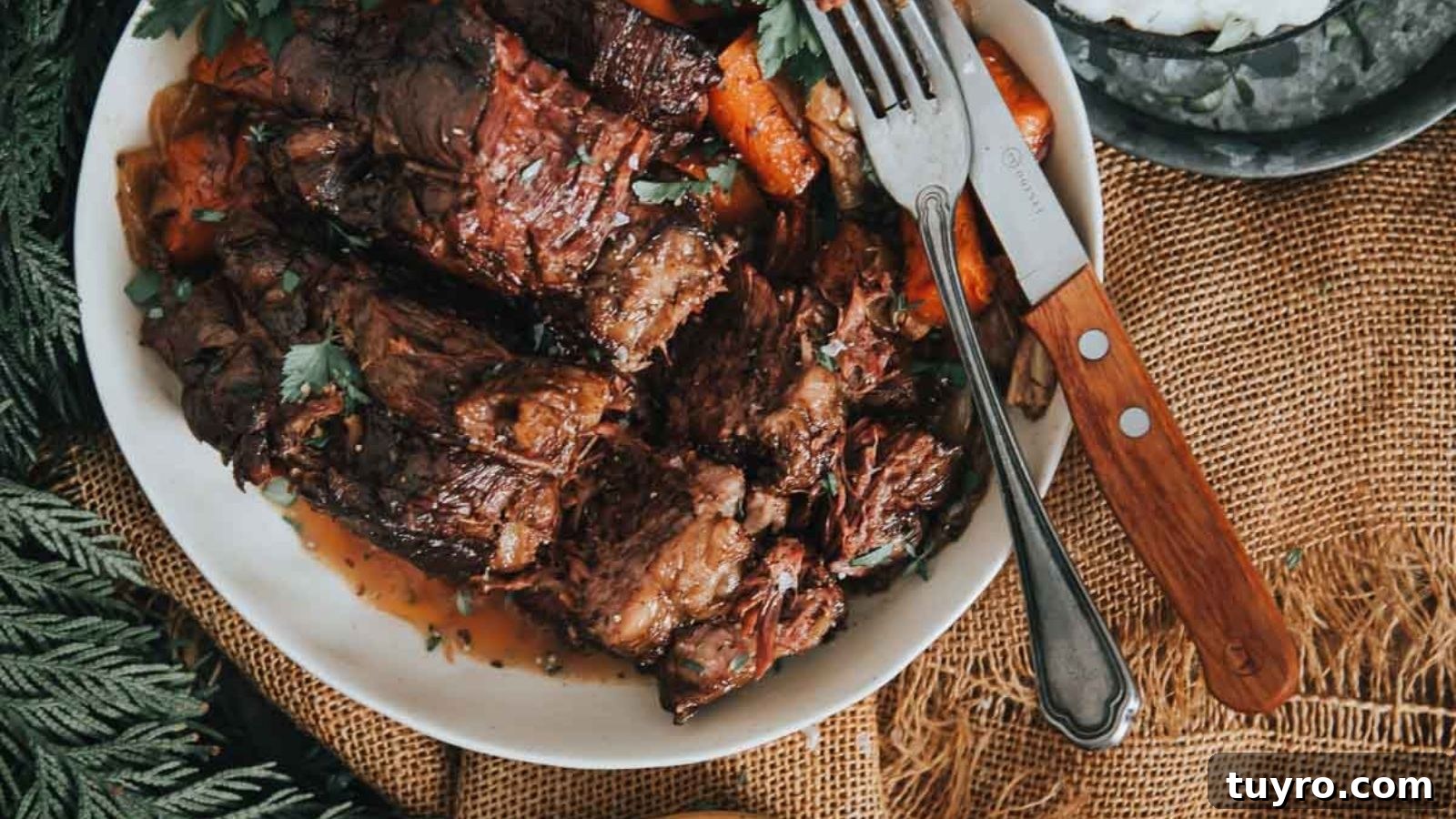 Slow cooker pot roast with tender beef and vegetables in rich broth.