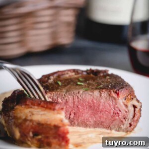 Sliced bacon wrapped filet mignon.