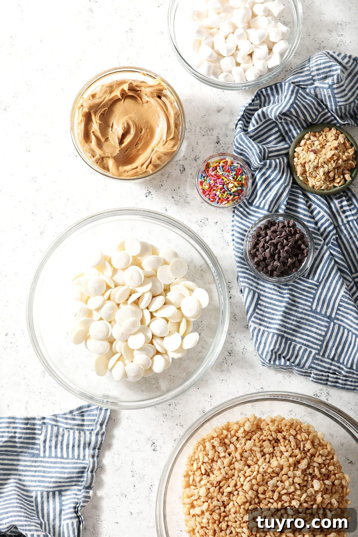 No-Bake Avalanche Cookies Recipe: No-Oven Snowball Treats 3 Ingredients to make no bake cookies in bowls on a marble countertop