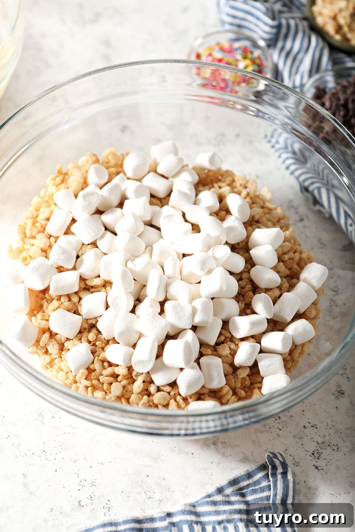 No-Bake Avalanche Cookies Recipe: No-Oven Snowball Treats 4 Rice Krispies and marshmallows in a bowl
