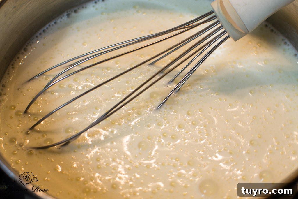 Whisking cream cheese custard