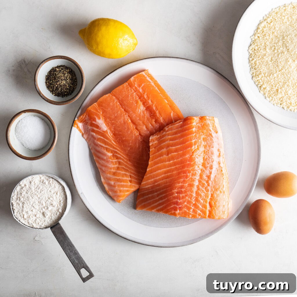 salmon fish sticks ingredients. fresh atlantic salmon, two eggs, all purpose flour, panko bread crumbs, one lemon, salt and pepper