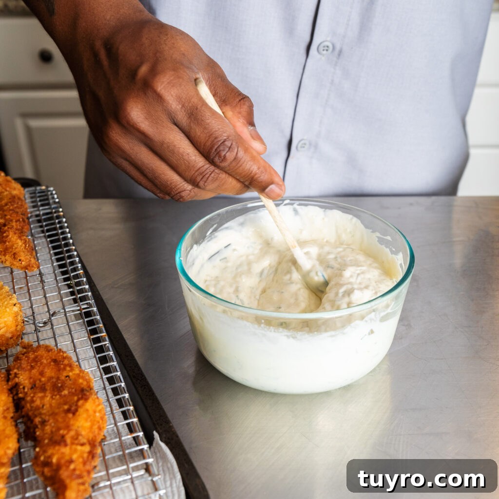 mixing tartar sauce ingredients in a small bowl