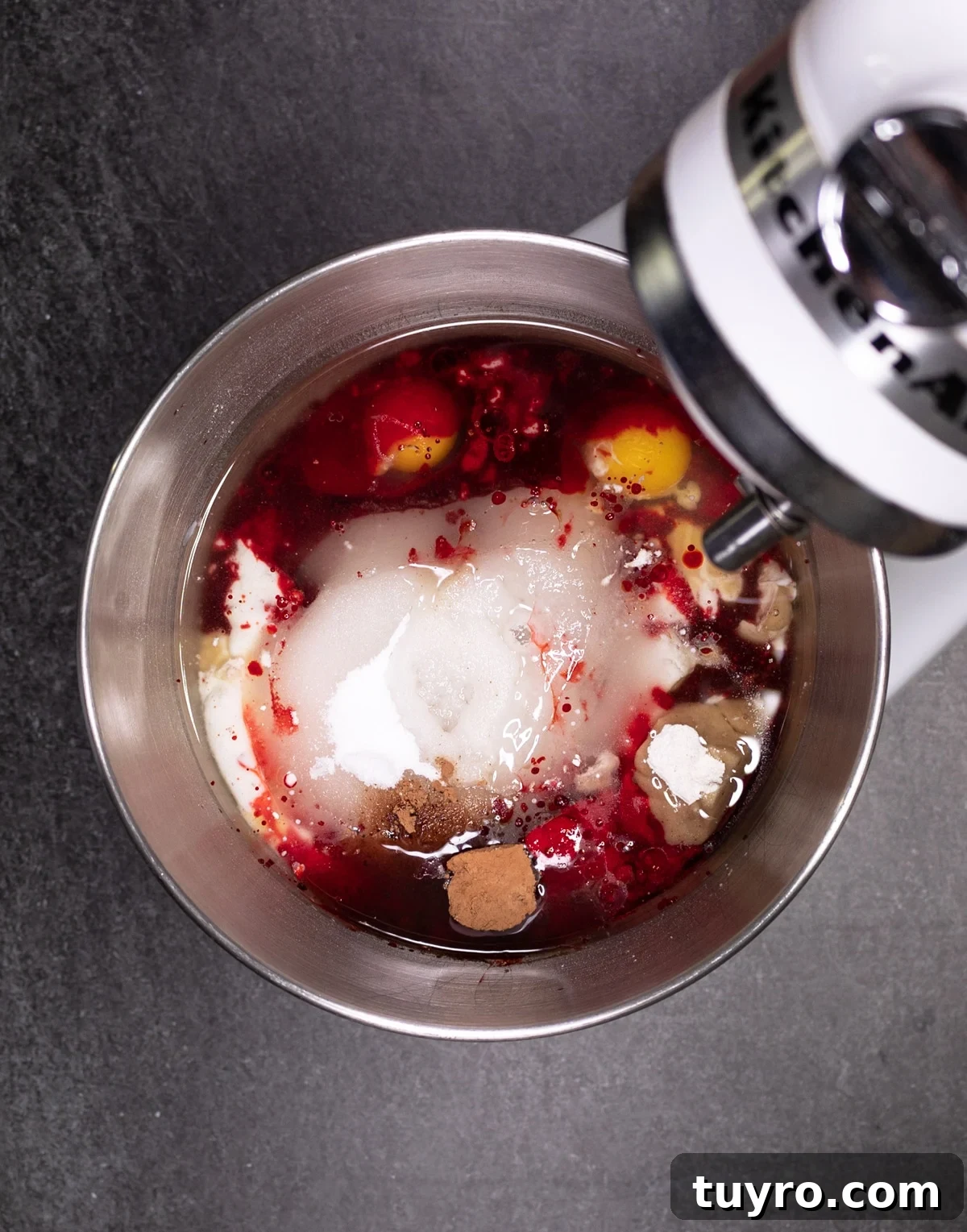 Classic Red Velvet Cake with Cream Cheese Frosting 7 red velvet cake ingredients in a bowl of a standing mixer.