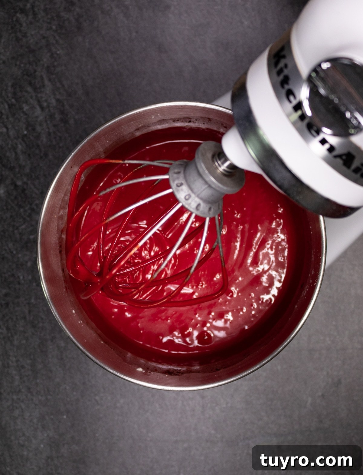 Classic Red Velvet Cake with Cream Cheese Frosting 8 standing mixer combining red velvet cake ingredients.