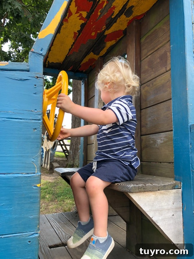 toddler pretending to drive