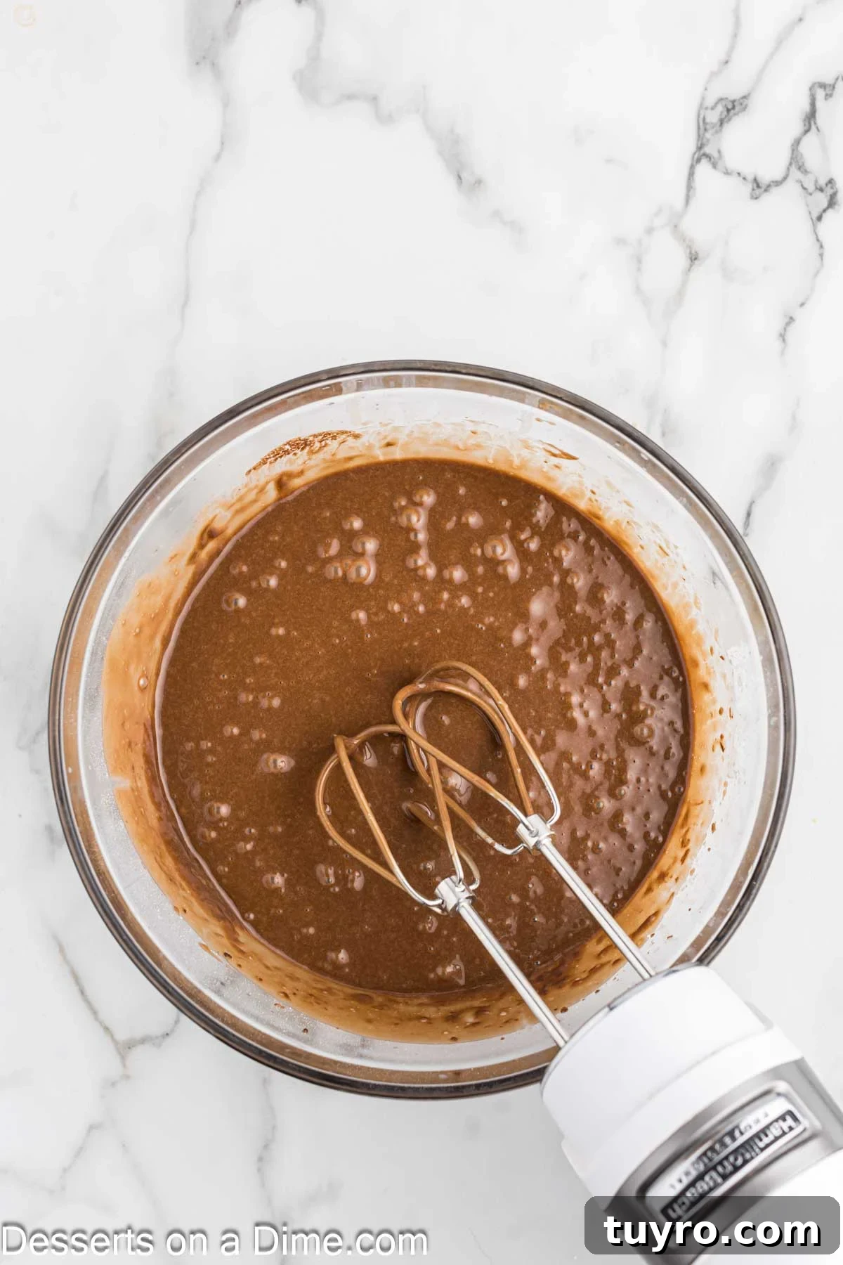Mini Texas Sheet Cake Bites Recipe — Perfect Chocolate Party Treat 6 Butter, eggs and vanilla added to cake mixture.