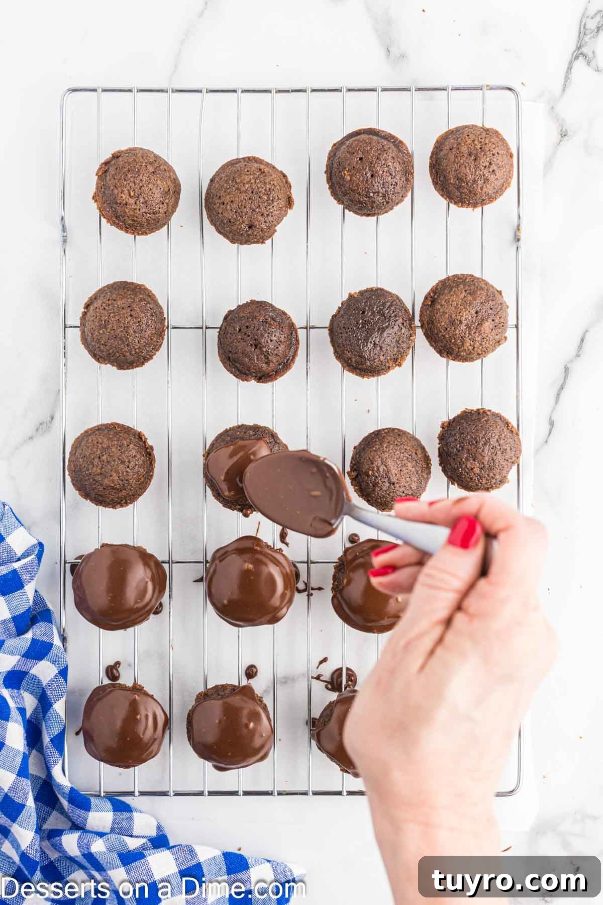 Mini Texas Sheet Cake Bites Recipe — Perfect Chocolate Party Treat 10 Frosting poured on each cake bite.
