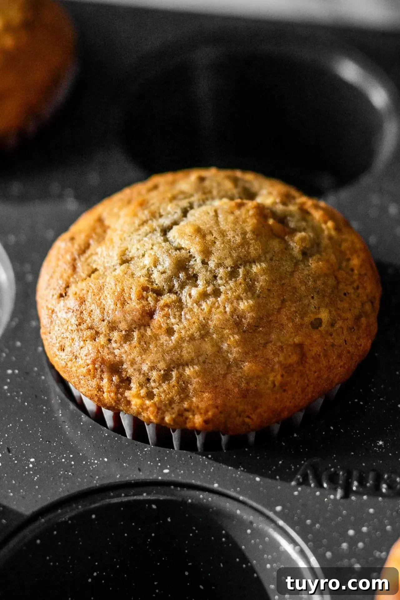 baked banana muffins in muffin tin