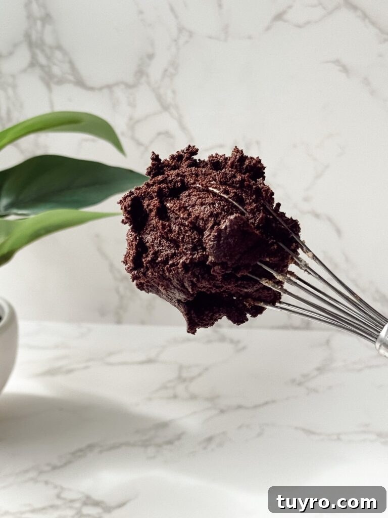 Single Serve Brookie Recipe for One 3 whisk with batter