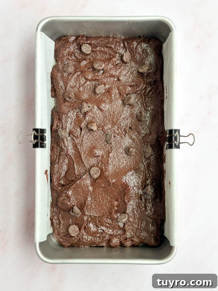 brownies in the pan before baking.