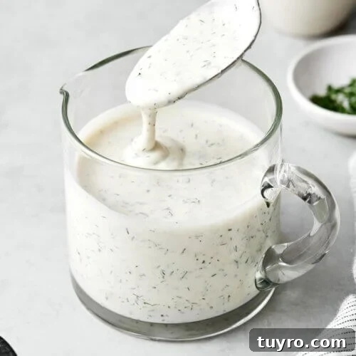 14 Fresh Salad Dressings and Vinaigrettes You’ll Love 11 A glass jar of homemade ranch dressing.